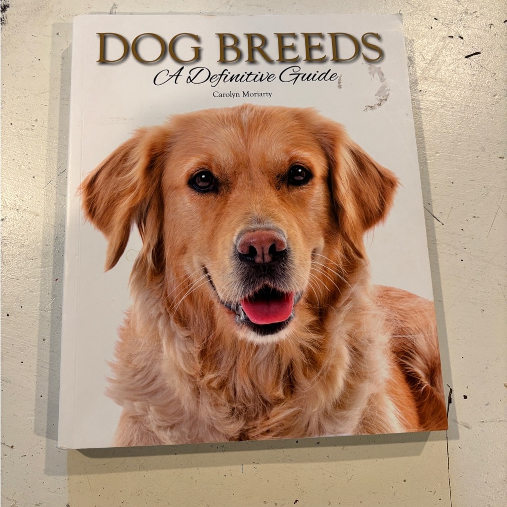 Dog Breeds: A Definitive Guide by Carolyn Muirarty-brand new book